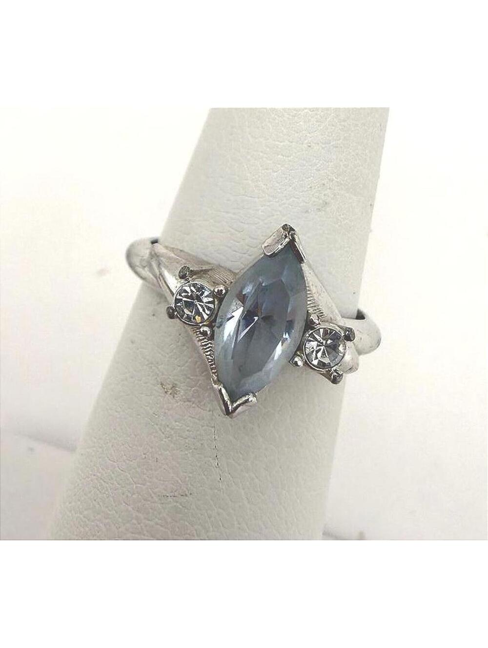 Avon 5.5 Silver Tone Ring with Marquise Blue Stone and Clear Accent Stones